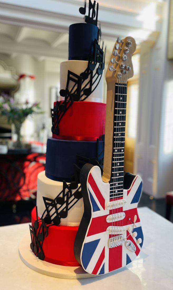 Lifesize Union Jack electric guitar wedding cake with sugar musical notes