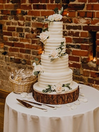 Buttercream Four-Tier Wedding Cake by Catherine Scott