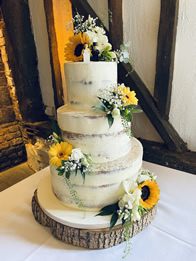 Semi-Naked Three-Tier Wedding Cake by Catherine Scott
