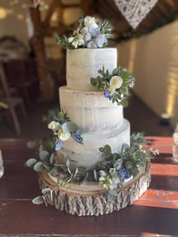 Semi-Naked Three-Tier Wedding Cake by Catherine Scott