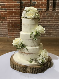 Semi-Naked Three-Tier Wedding Cake by Catherine Scott