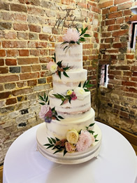 Semi-Naked Four-Tier Wedding Cake by Catherine Scott
