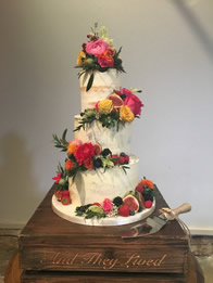 Fruit and Bright Flowers — Semi-Naked Wedding Cake by Catherine Scott